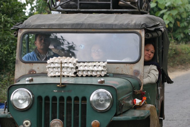 Carton of eggs on the bonnet of a Jeep in Darjeeling